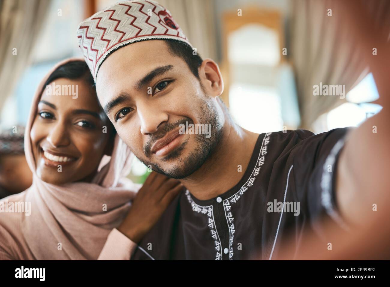 Remembering these precious times with her. a young muslim couple taking selfies together. Stock Photo