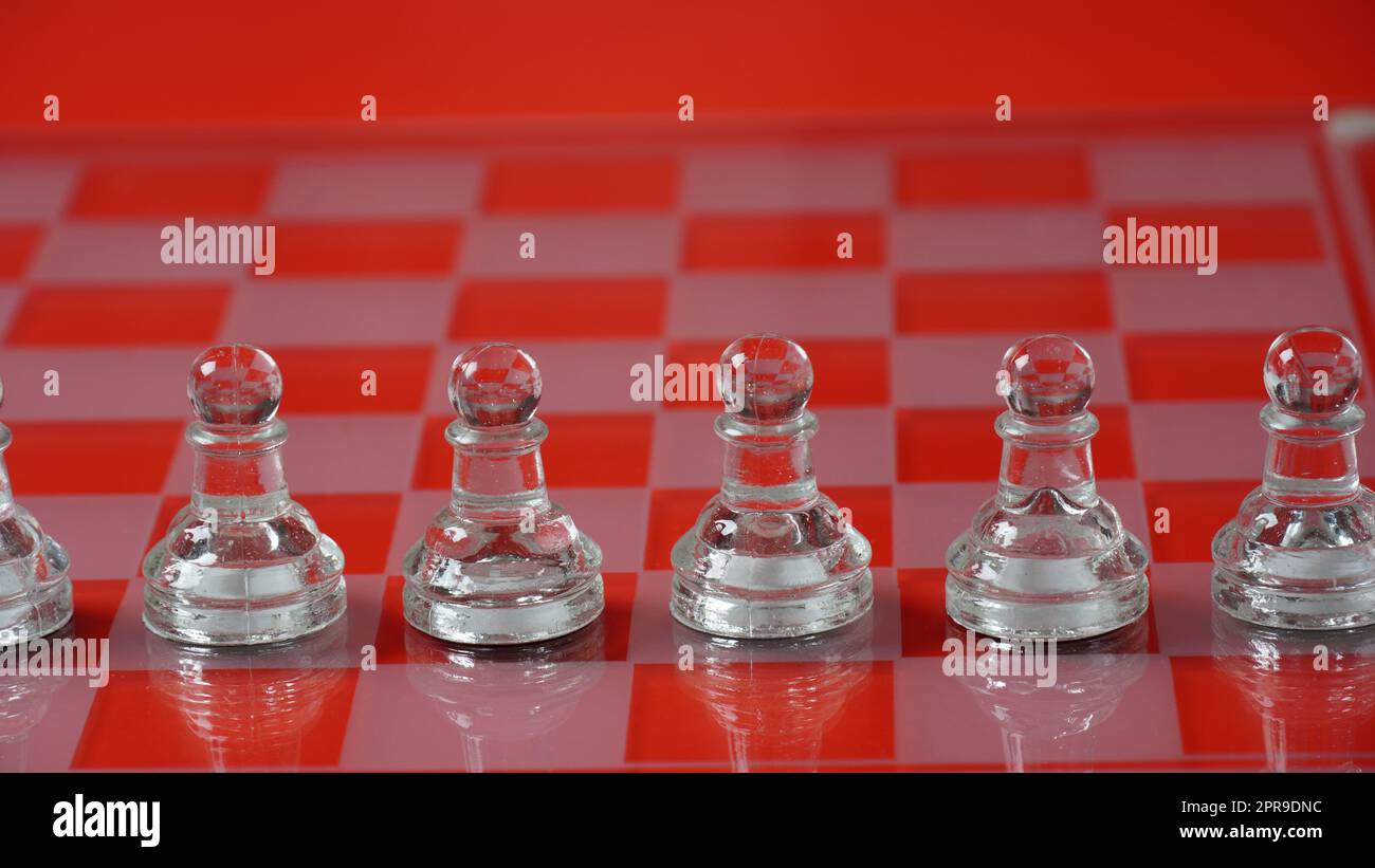 Chess pieces: 32 red and white ivory pieces without board., Complete number  of pieces of a chess game. Sixteen cut ivory pieces that have been made red  with a dyestuff: these are