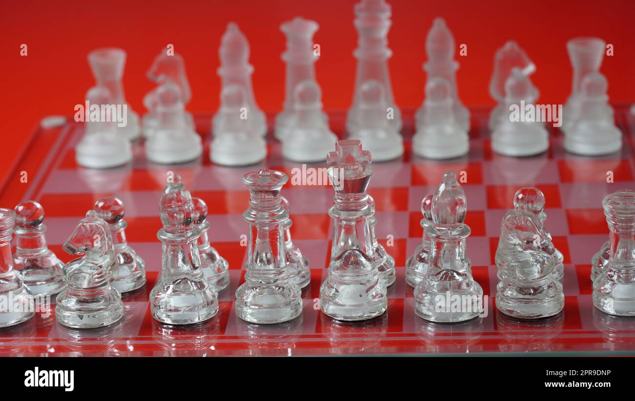 Chess pieces in starting position on a wooden Board Stock Photo by  ©Rostislavv 141334490