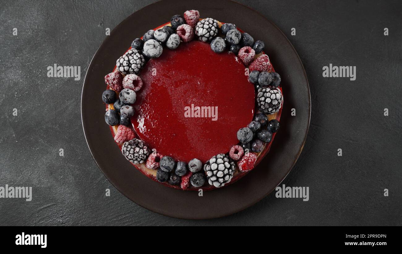 Berry jelly cake with frozen strawberries, blueberries, raspberries