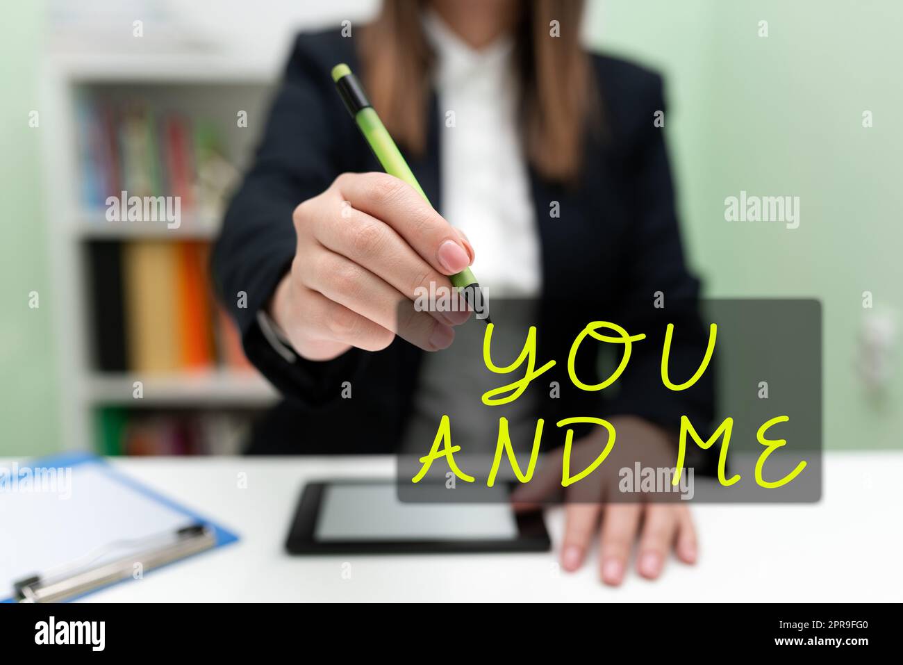 Text sign showing You And Me. Business idea Couple Relationship compromise Expressing romantic feelings Businesswoman Having Tablet On Desk And Pointing New Ideas With Pen. Stock Photo