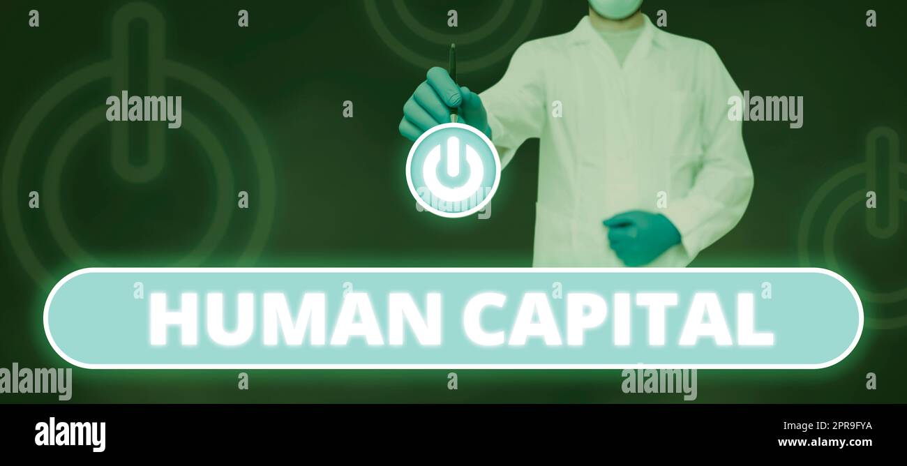 Hand writing sign Human Capital. Word Written on Intangible Collective Resources Competence Capital Education Doctor Pointing With Pen On Power Button And Presenting New Ideas. Stock Photo