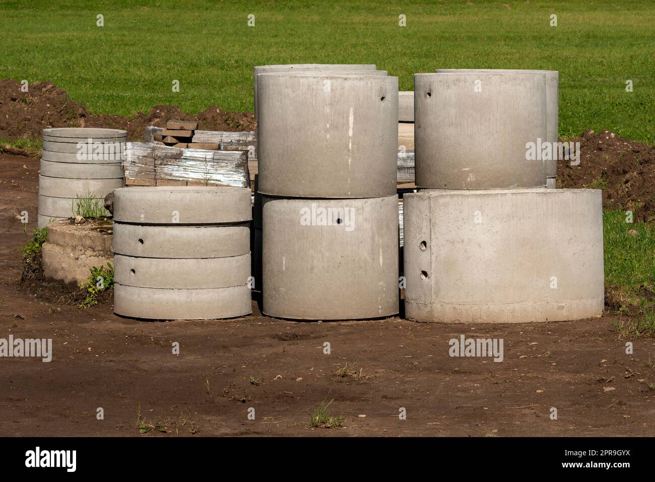 Reinforced concrete rings for the well and sewer Stock Photo