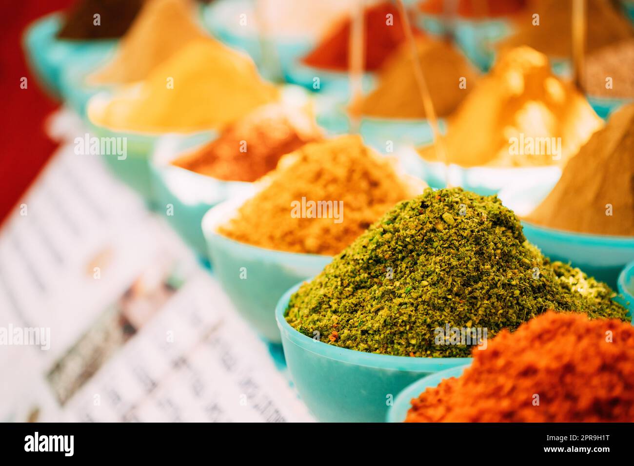 Close View Of Masala Curry, Bright Colors Fragrant Seasoning, Condiment In Tray On Local Food Market, Bazaar Stock Photo