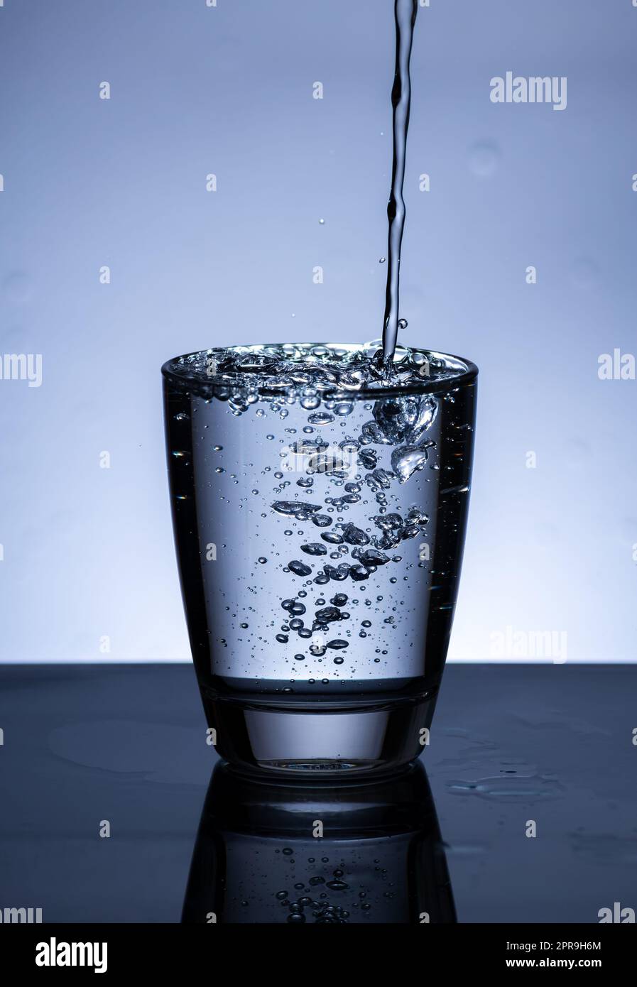https://c8.alamy.com/comp/2PR9H6M/the-image-of-pouring-drinking-water-into-a-glass-2PR9H6M.jpg