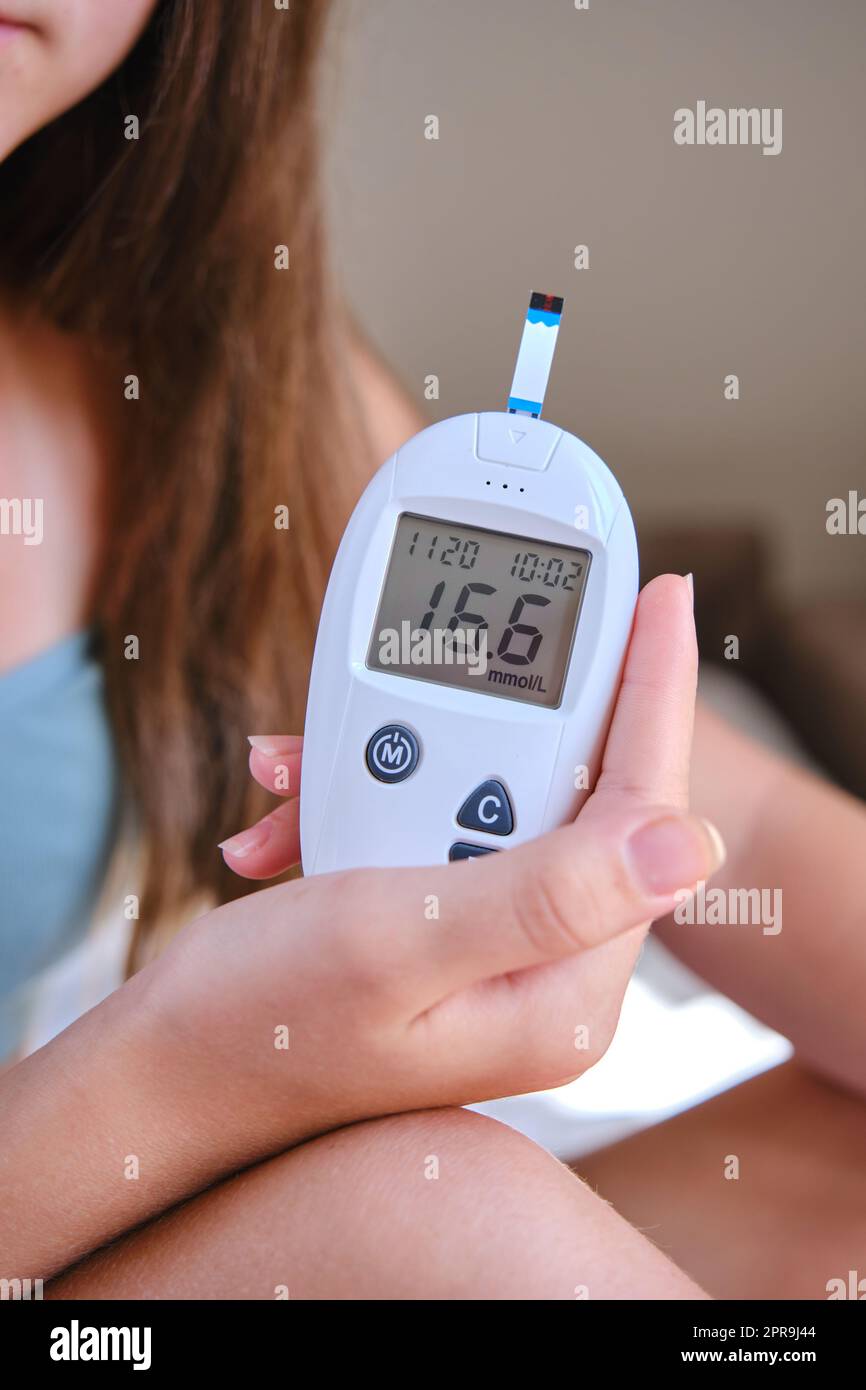 Close-up of a glucometer with the results of a glucose test. Home blood ...