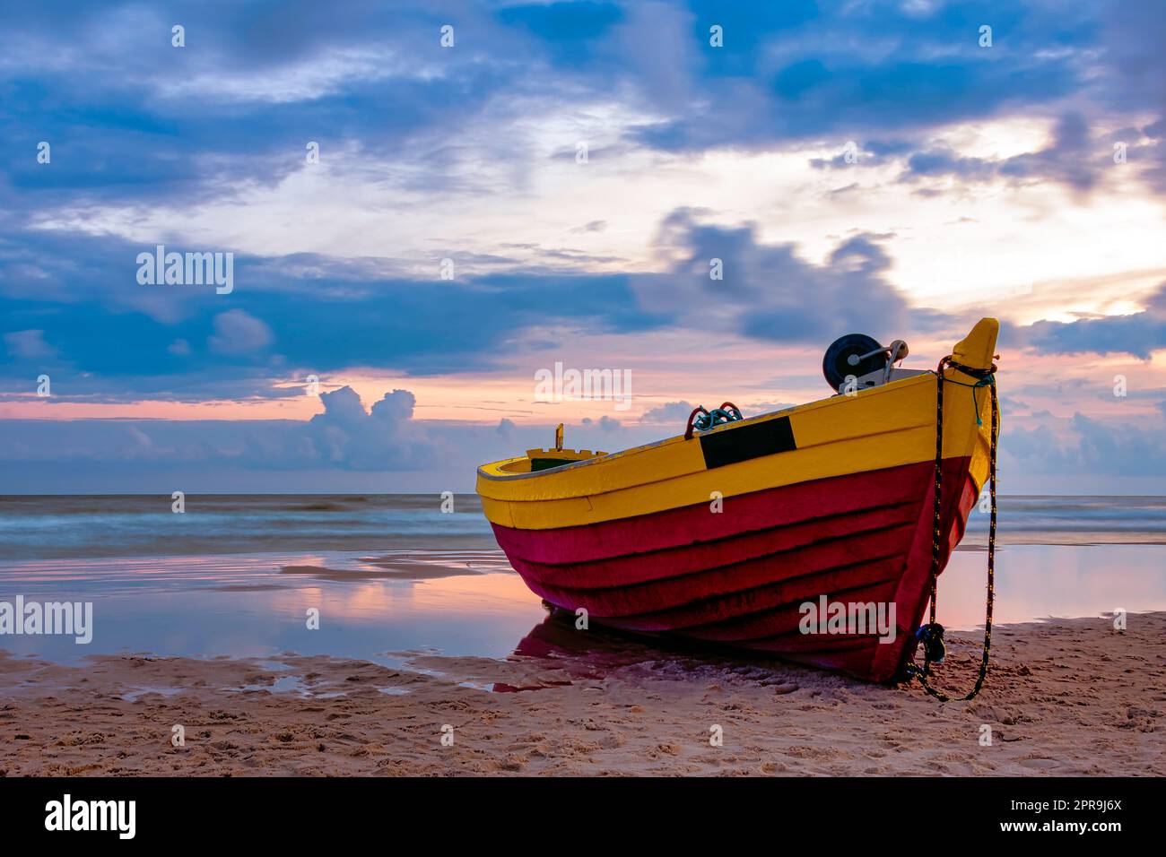 Sunset over boat on sea hi-res stock photography and images - Alamy