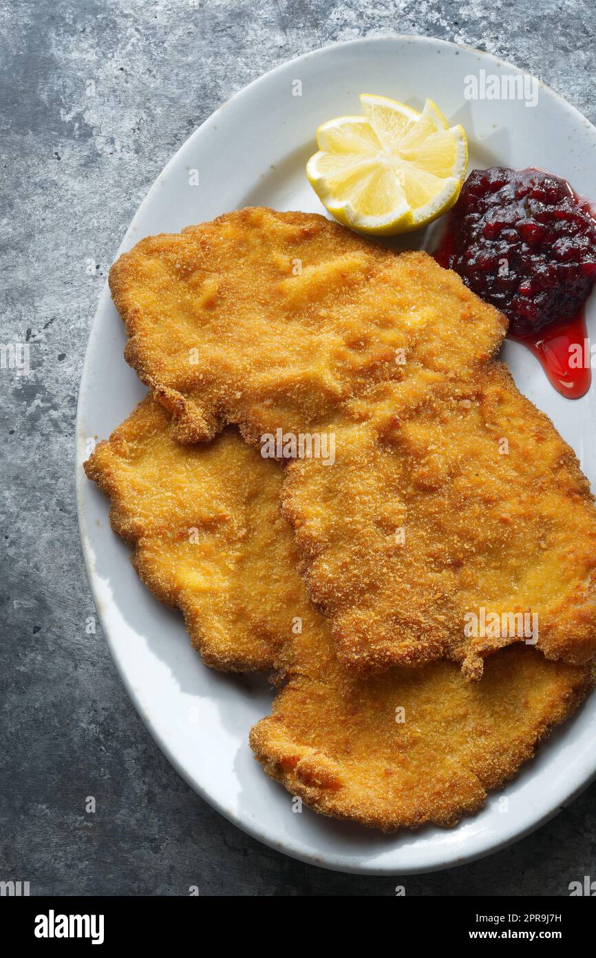 Deep fried chicken schnitzel hires stock photography and images Alamy