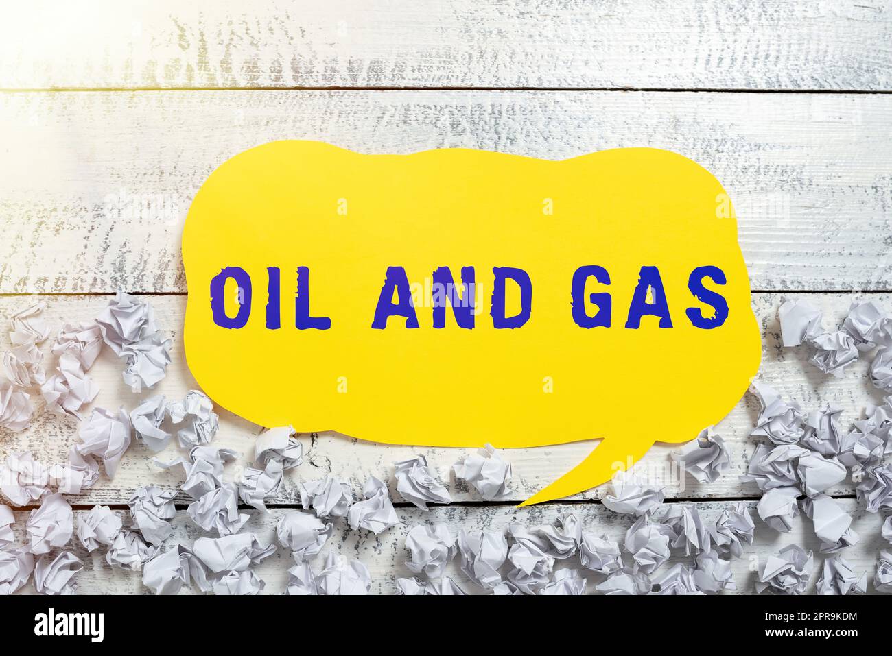 Text sign showing Oil And Gas. Business approach Exploration Extraction Refining Marketing petroleum products Speech Bubble With Important Information Written In With Paper Wraps Under. Stock Photo