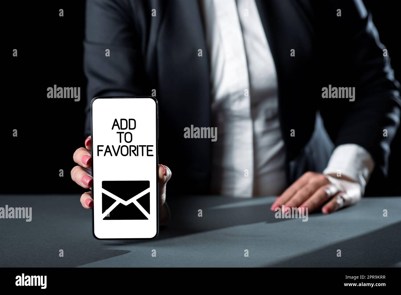 Handwriting text Add To Favorite. Word for Like a page social network community stay always connected Businesswoman Holding Phone And Presenting Important Informations On Screen Stock Photo