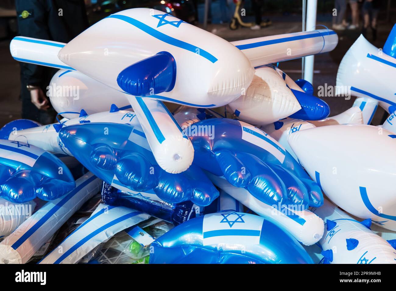 Toys as an inflatable hammers and a clubs with images of national