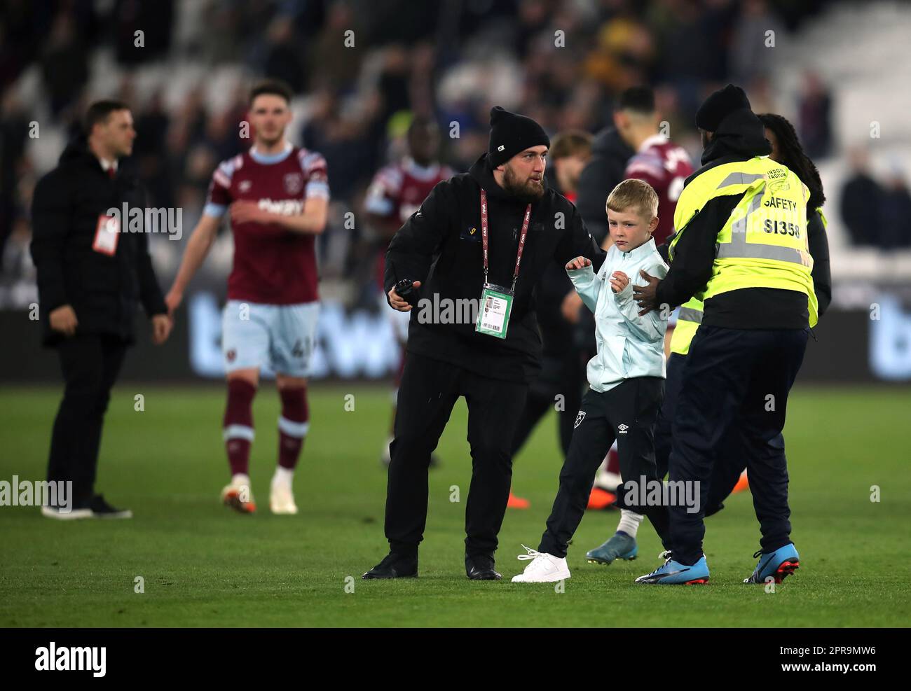 A fan invades the pitch following during the Premier League match at