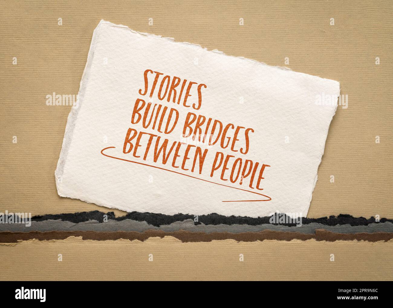stories build bridges between people, inspirational message on an art paper, communication concept Stock Photo
