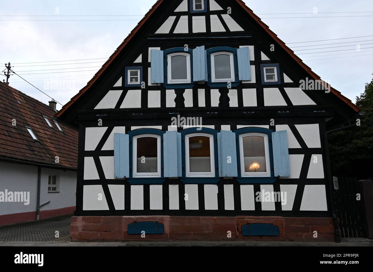 Half-timbered house in Neuburg on the river Rhine Stock Photo