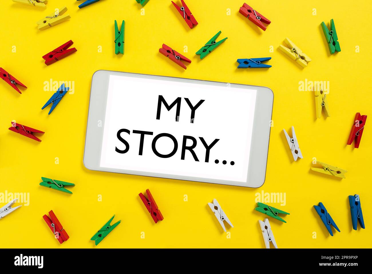 Hand writing sign My Story.... Word Written on telling someone or readers  about how you lived your life Colorful Pegs Placed Around Tablet Screen  With Important Information Stock Photo - Alamy