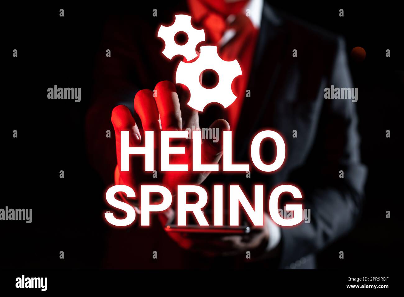Handwriting text Hello Spring. Business concept Welcoming the season after the winter Blossoming of flowers Man Holding Tablet And Pointing With One Finger On Important Message Stock Photo