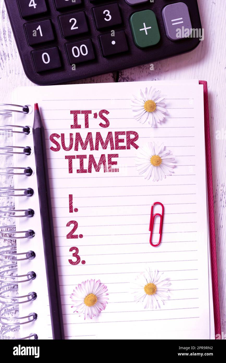 Conceptual display It S Summer Time. Word for Relax sunny hot season of the year Vacation beach trip New Ideas Written On Notebook With Flowers, Pencil And Clip Around. Stock Photo