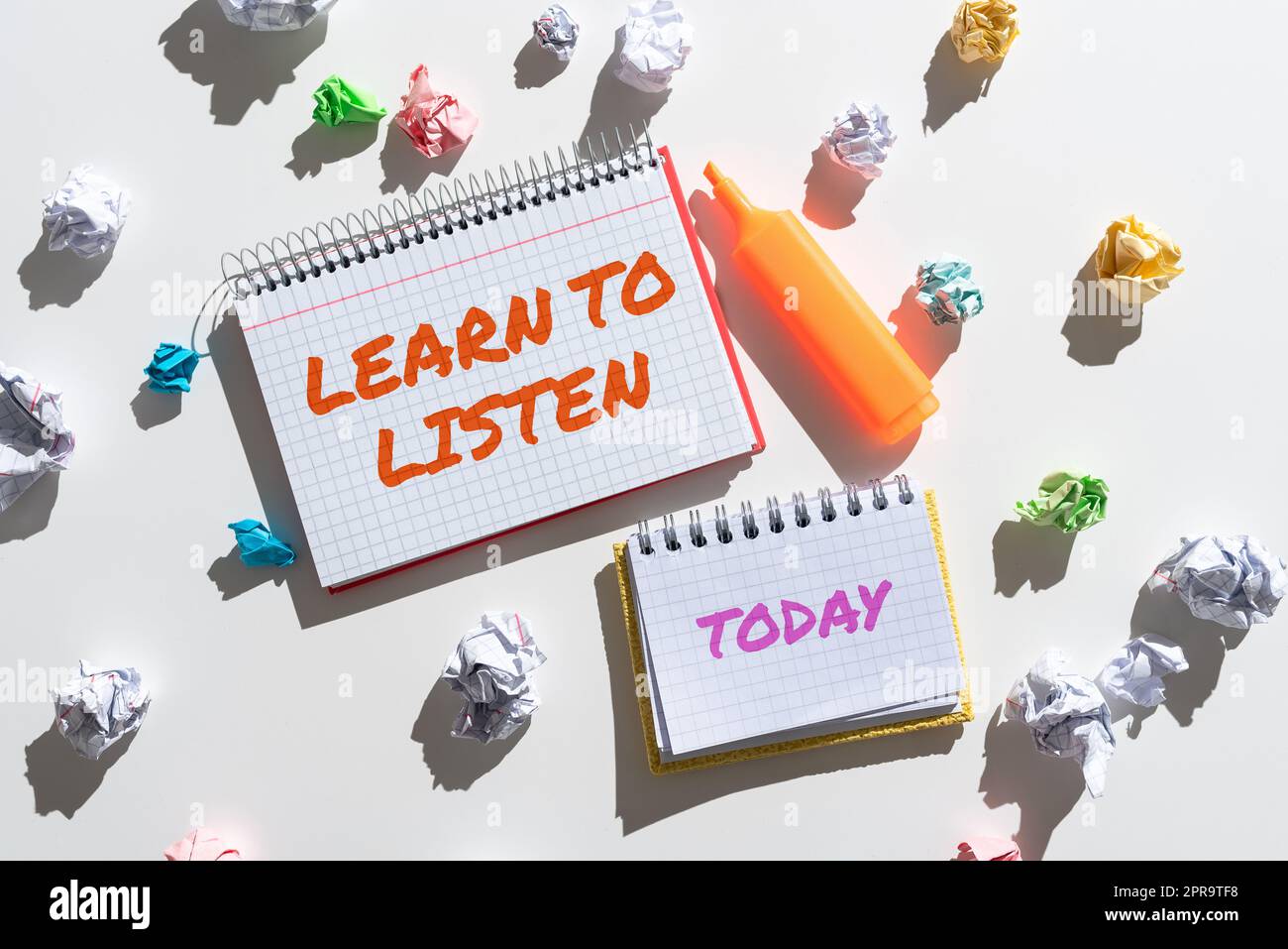 Text showing inspiration Learn To Listen. Business concept Able to understand what showing tells you be respectful Notebooks With Important Messages Surrounded By Paper Wraps. Stock Photo