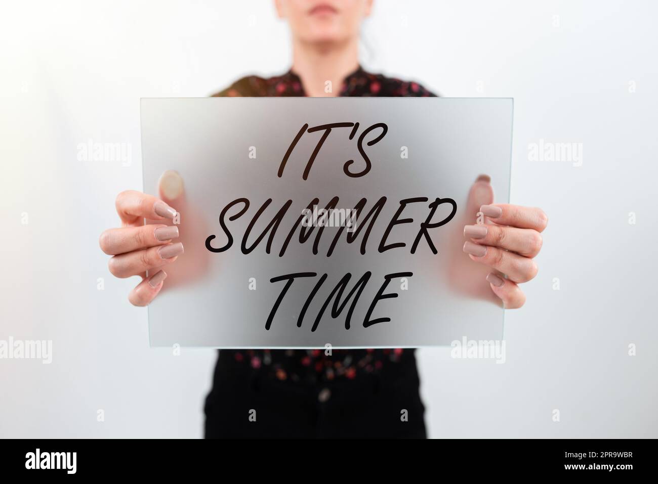Text showing inspiration It S Summer Time. Business approach Relax sunny hot season of the year Vacation beach trip Woman Showing Placard And Presenting Important Ideas For Marketing. Stock Photo