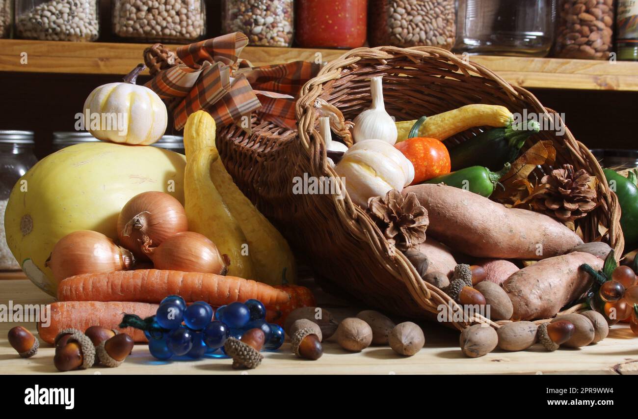 Baskets of Fresh Vegetables and Bread in Rustic Kitchen With Jars of