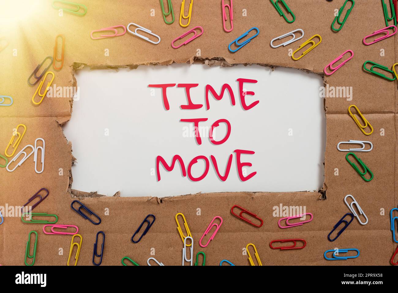 Writing displaying text Time To Move. Business approach Best period to transfer Relocation Change the current path Important Ideas Written Under Ripped Cardboard With Paperclips Around. Stock Photo