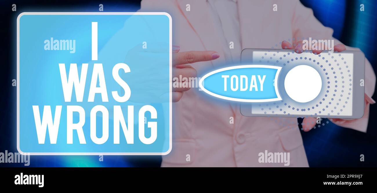 Conceptual caption I Was Wrong. Business concept Acceptance of a mistake error Giving an apology Failure Man With A Tablet Pointing On A Digital And Presenting Important Data. Stock Photo
