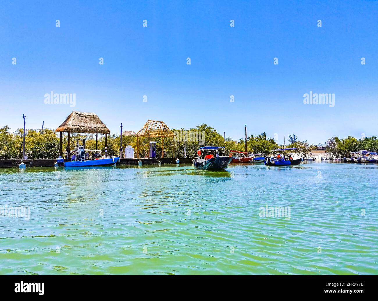 Panorama landscape Holbox boats port harbor Muelle de Holbox Mexico