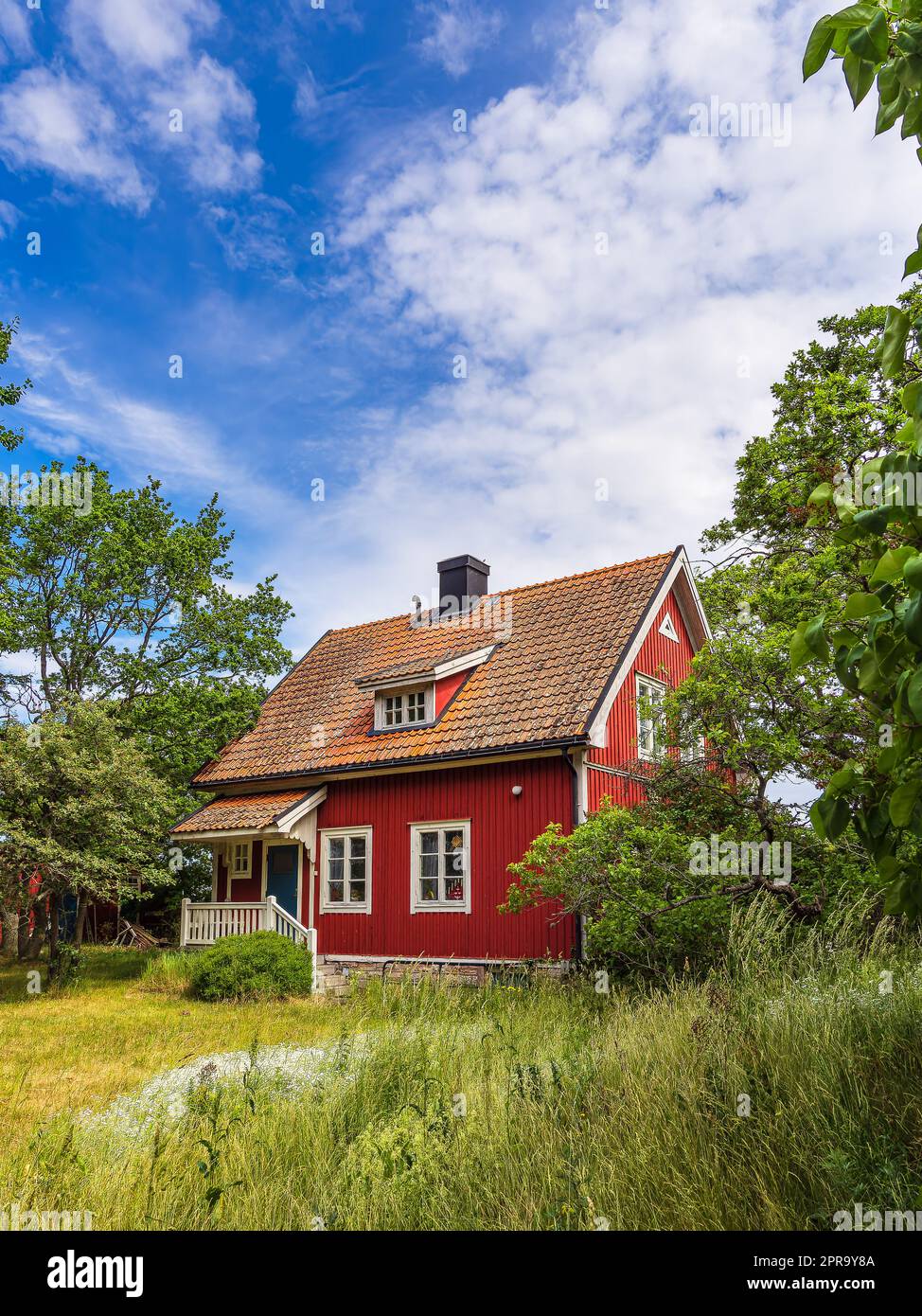 Red wooden house on the island Öland in Sweden Stock Photo - Alamy