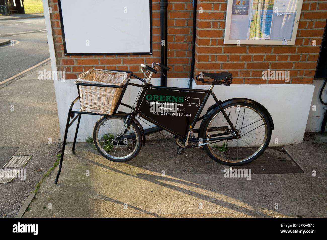 Old fashioned Butchers bicycle, Theydon Bois; village in; Epping Forest; Essex. Stock Photo