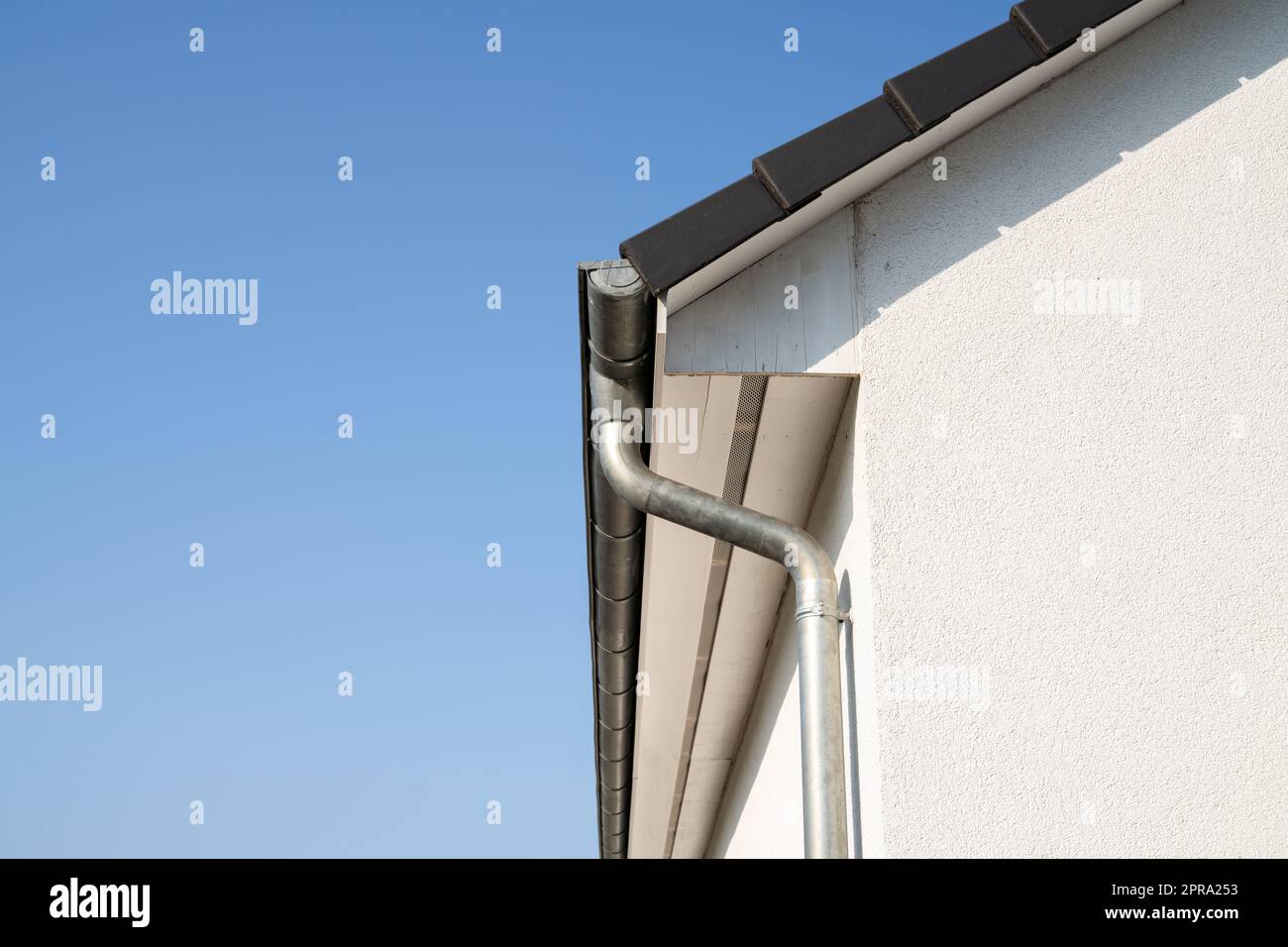 House Roof Drainage. Residential Home Exterior Stock Photo