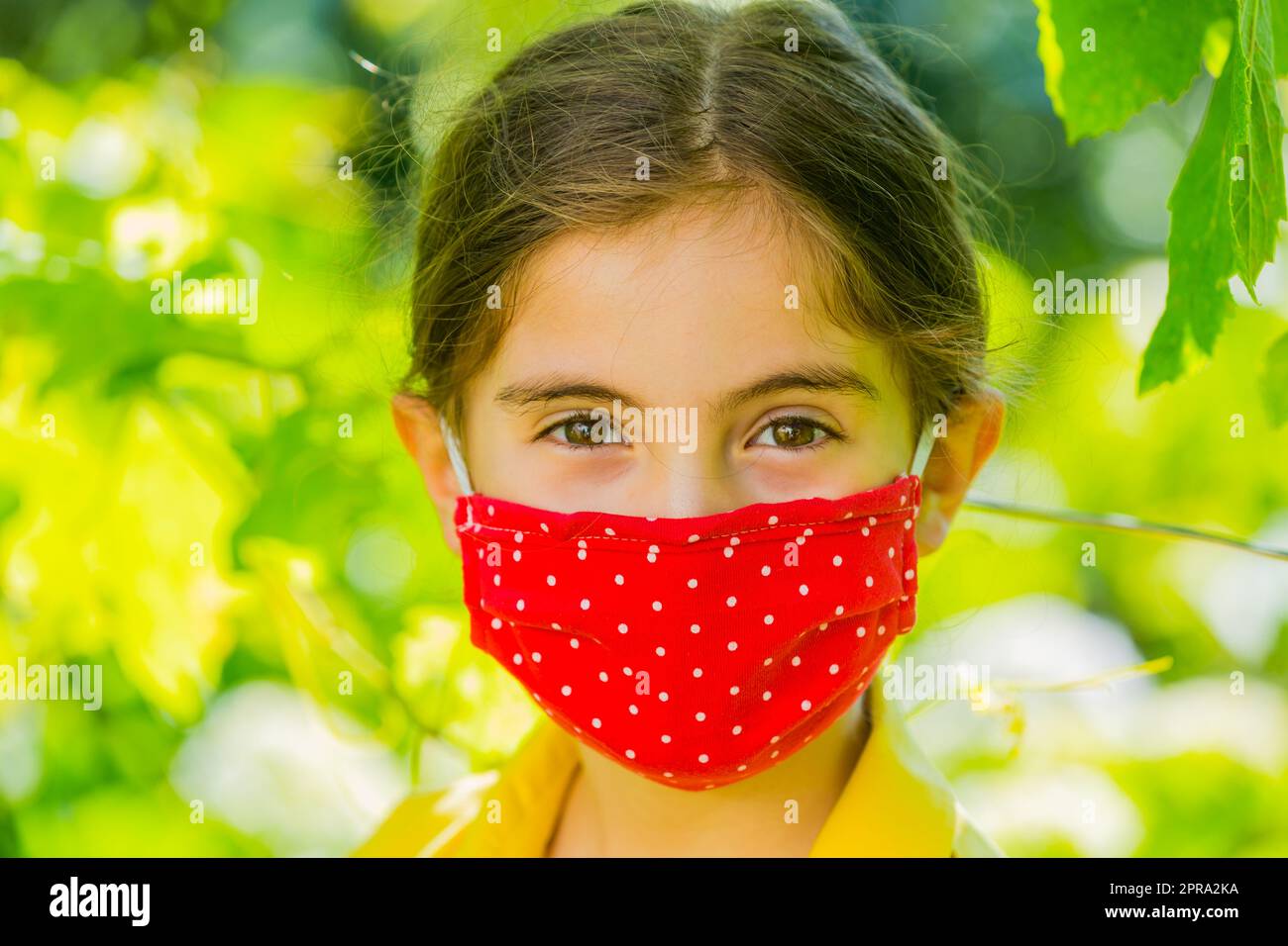 Little girl with mask Stock Photo Alamy