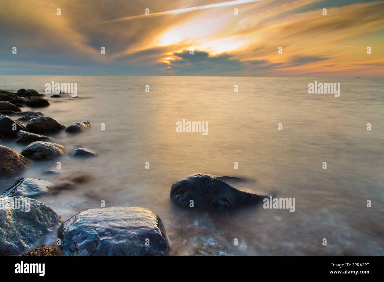 sunset at coast of fehmarn island Stock Photo