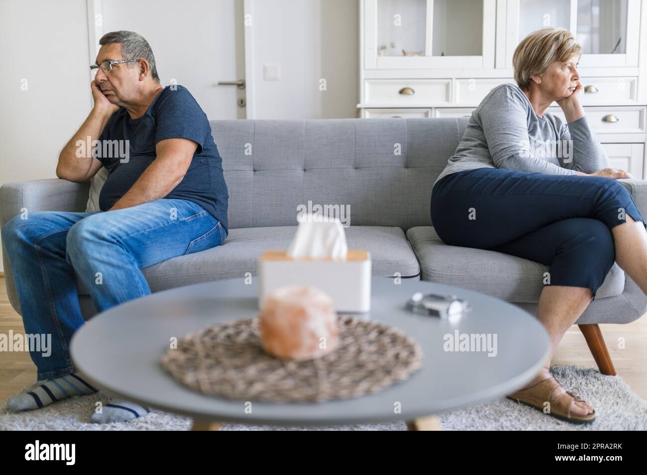 Upset senior couple at home having an argument Stock Photo