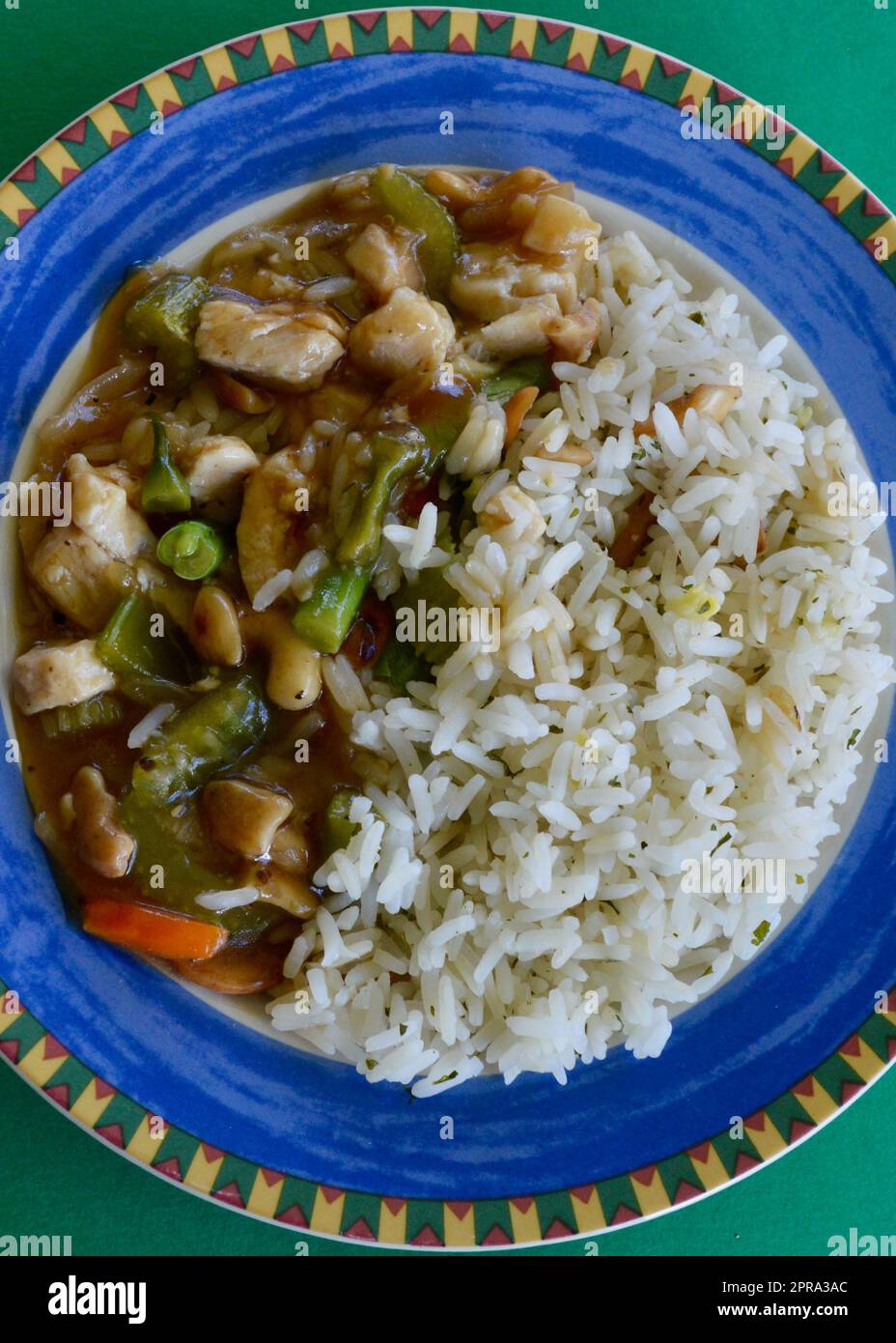 Chicken And Rice On A Colorful Plate Stock Photo Alamy chicken-and-rice-on-a-colorful-plate-stock-photo-alamy