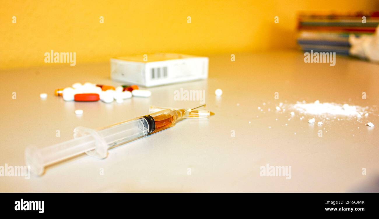 Drugs pills shots cigarettes and alcohol dependence and addiction. Stock Photo