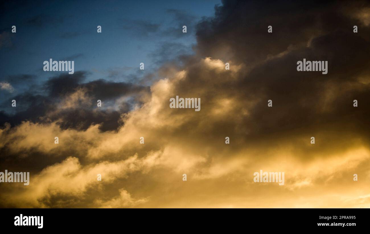 Dramatic sky with clouds at sunset Stock Photo - Alamy