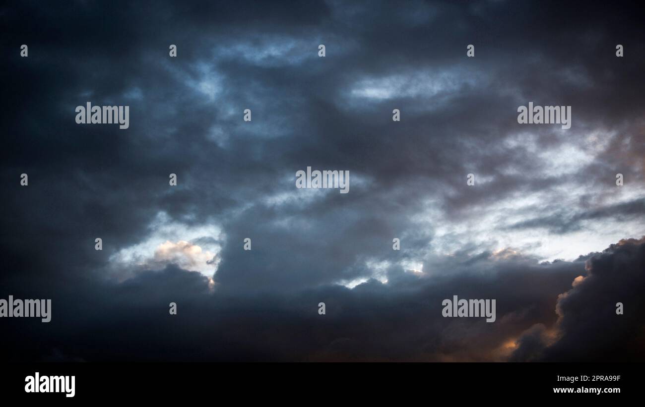 Dramatic sky with clouds at sunset Stock Photo - Alamy
