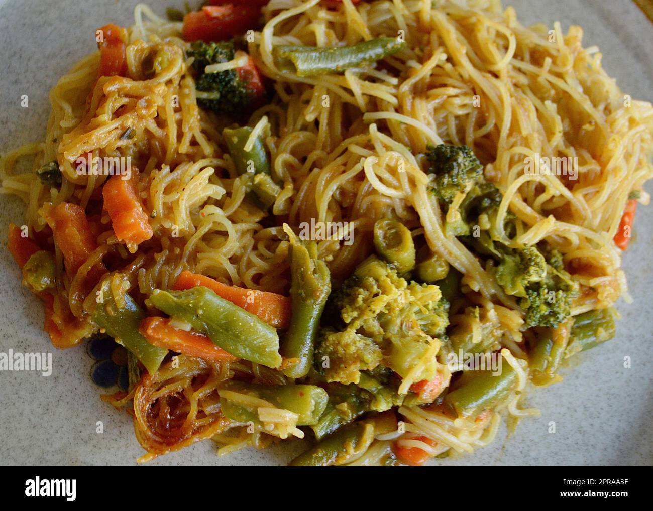 Singapore noodles and vegetables Stock Photo
