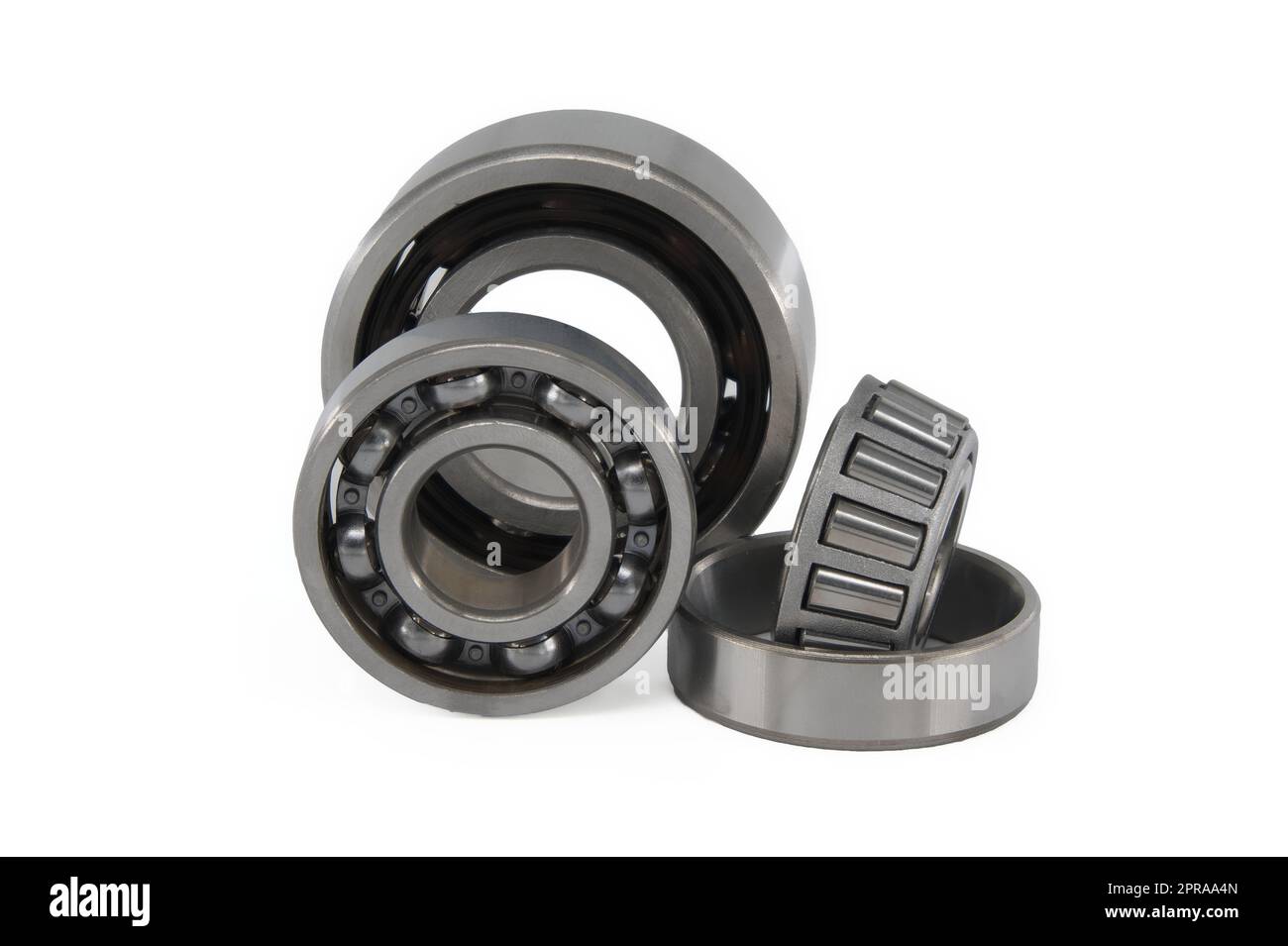 Group of various ball and roller bearings on white Stock Photo - Alamy