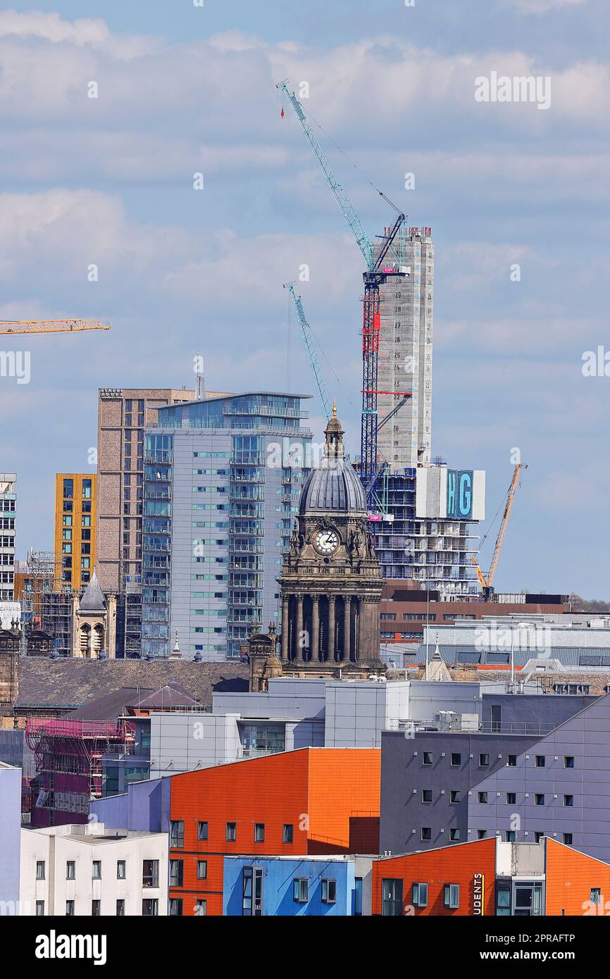 A view of the town hall clock tower with a new tall building under construction at 44 Merrion