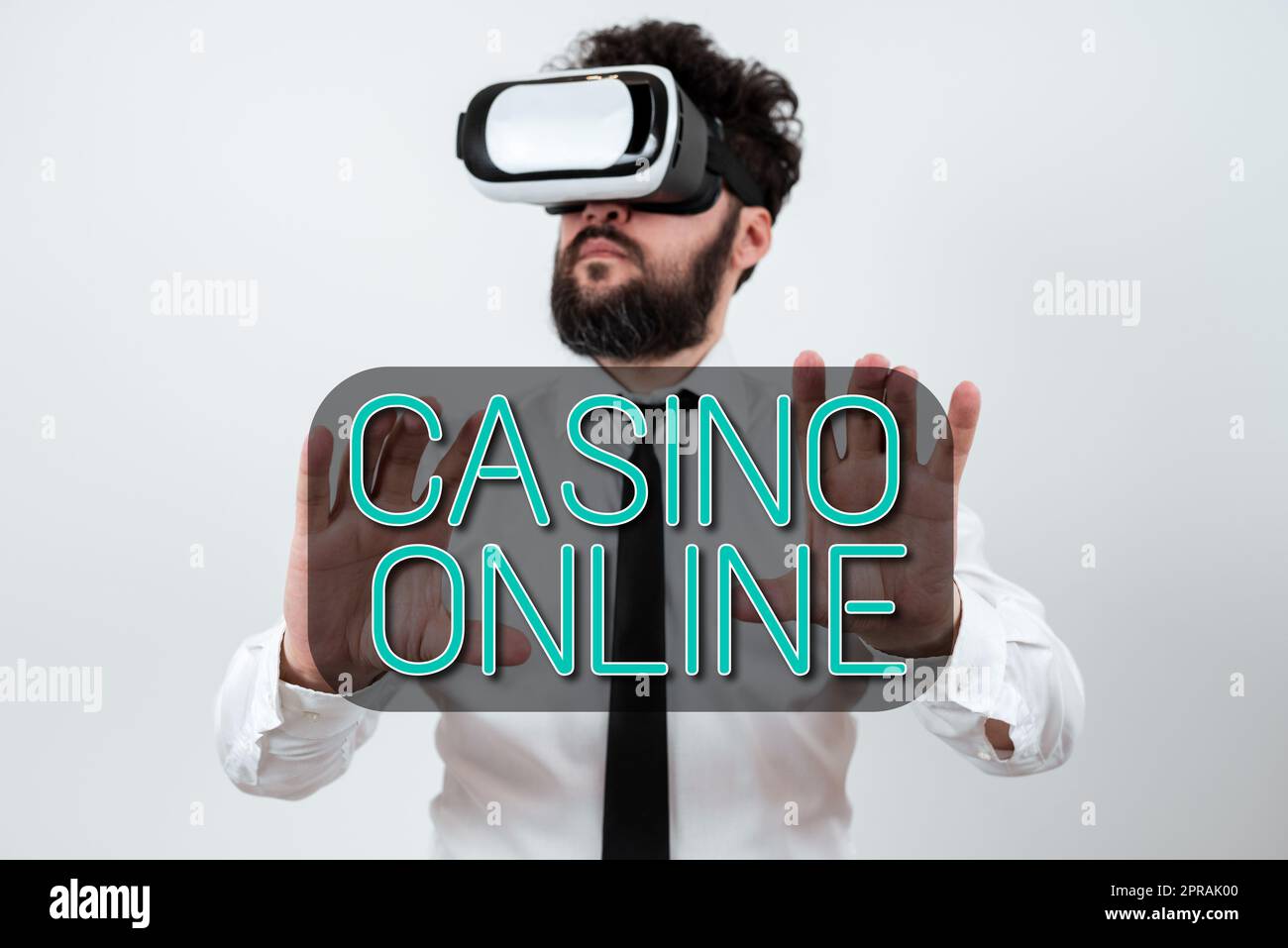 sign-displaying-casino-online-concept-meaning-computer-poker-game-gamble-royal-bet-lotto-high-stakes-man-wearing-vr-glasses-and-presenting-important-messages-between-hands-2PRAK00.jpg