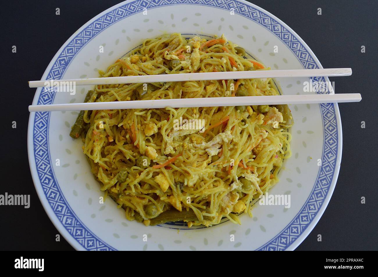 Chicken Singapore noodles Stock Photo
