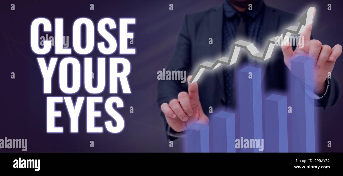 Text sign showing Close Your Eyes. Word for Cover your sight we have a surprise for you do not peek Man In A Suit Showing Crucial Data Charts And Growth In Business. Stock Photo