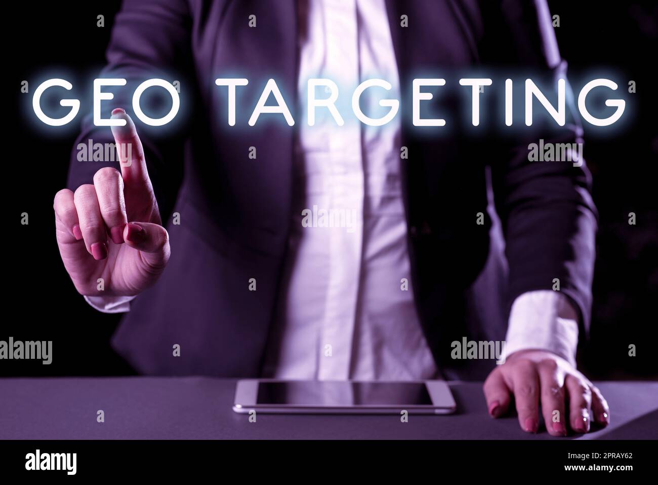 Sign displaying Geo Targeting. Concept meaning Digital Ads Views IP Address Adwords Campaigns Location Businesswoman Having Tablet On Desk And Pointing New Ideas With One Finger. Stock Photo