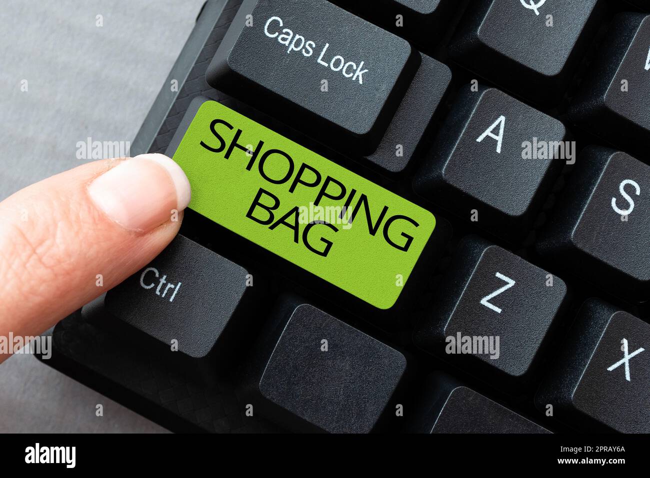 Conceptual caption Shopping Bag. Internet Concept Containers for carrying personal possessions or purchases -49198 Stock Photo