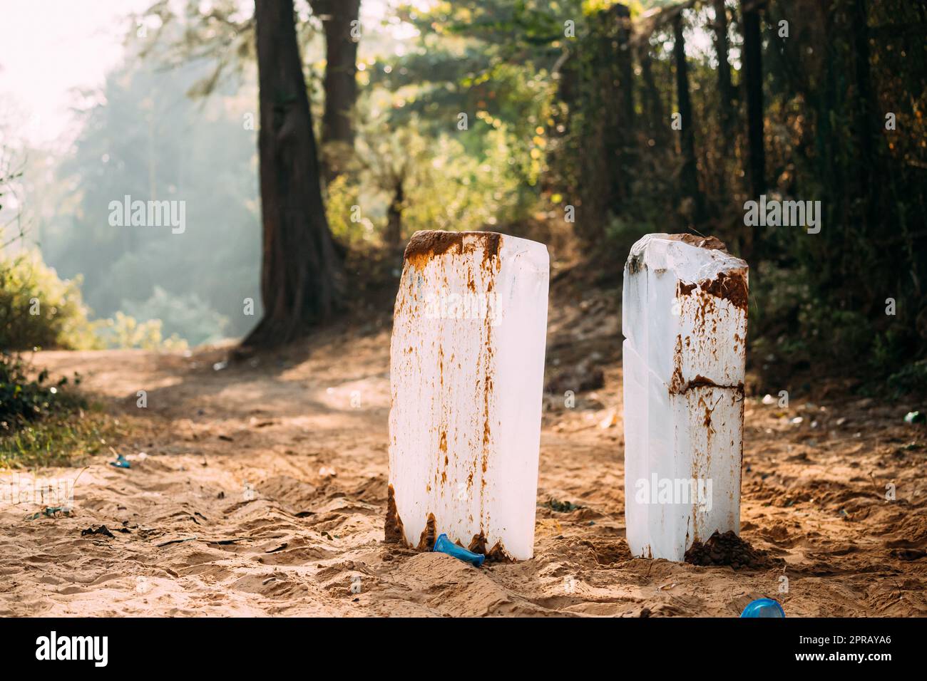 Goa, India. Pieces Of Ice Standing On Sand Stock Photo
