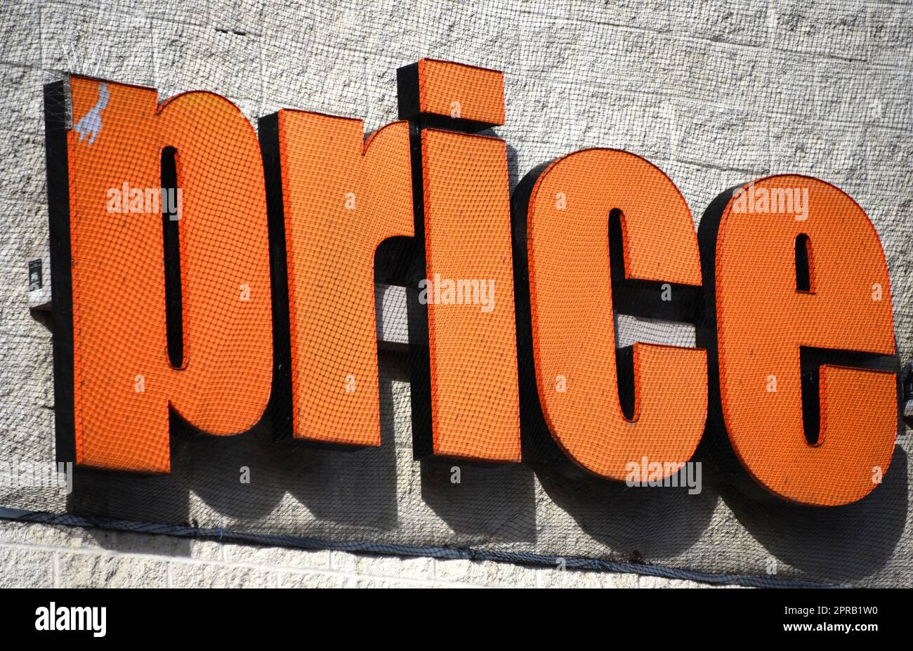 One word, price, illustrates the shopping experience. Orange letters ...