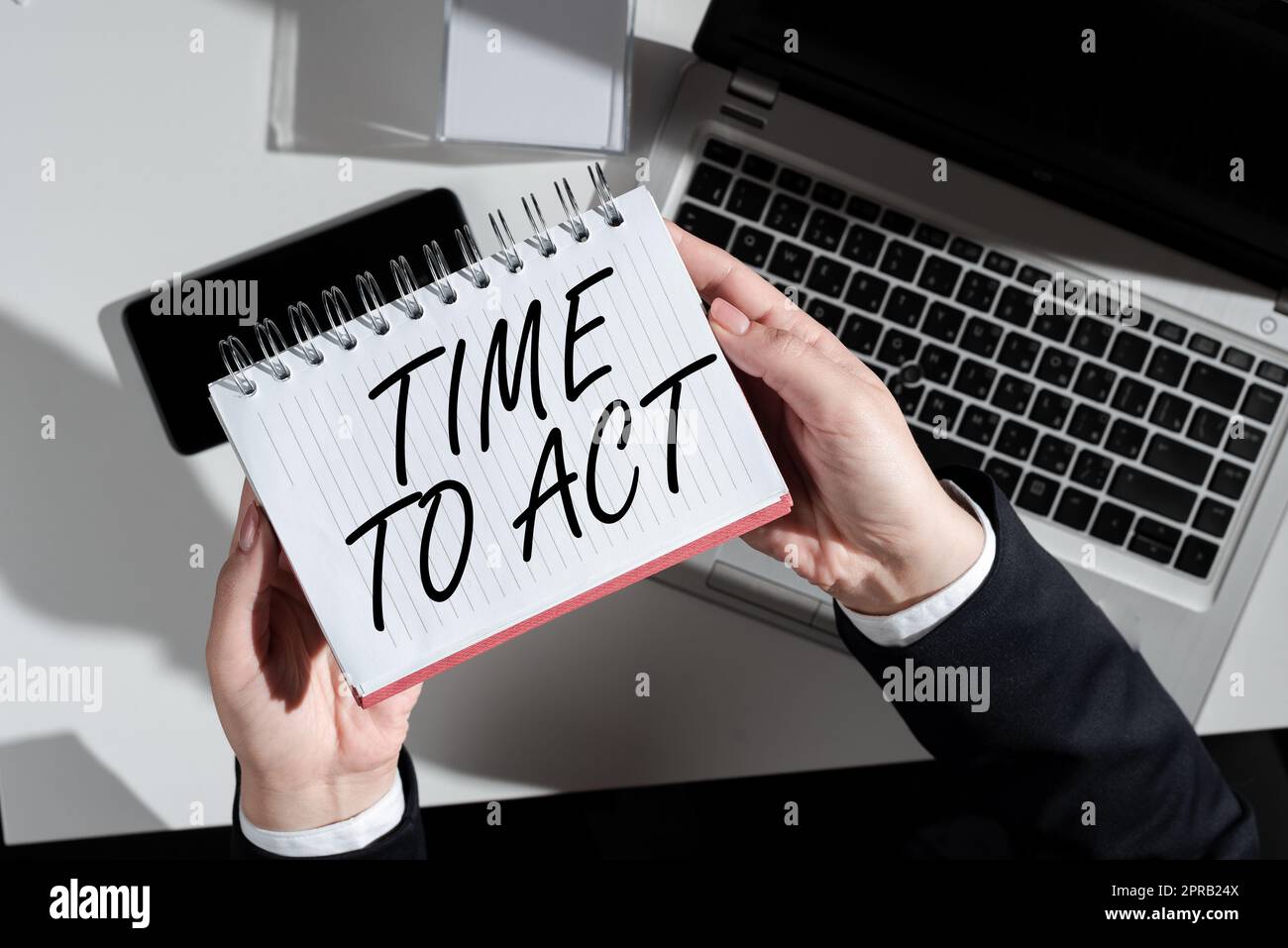 Text sign showing Time To Act. Business approach Do it now Response Immediately Something need to be done Businesswoman Holding Notebook Over Desk With Notes, Cellphone And Lap Top. Stock Photo