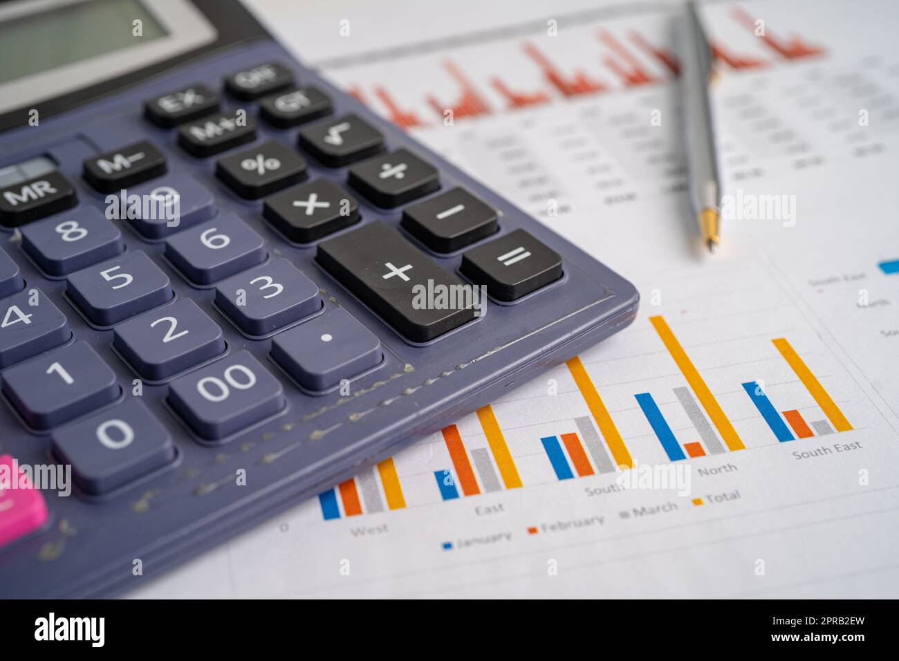 Calculator on graph paper. Finance development, Banking Account, Statistics, Investment Analytic research data economy, Stock exchange trading, Business company concept. Stock Photo
