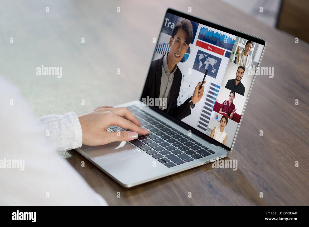 Back view of woman sit at desk at home have webcam conference on laptop computer with business partner or client. Work from home concept Stock Photo